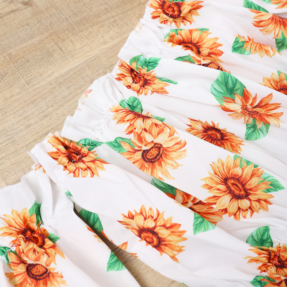 Girls New Korean Version Of Long Sleeve Sunflower Flared Top + Solid Color Suspender Skirt Two-Piece Set